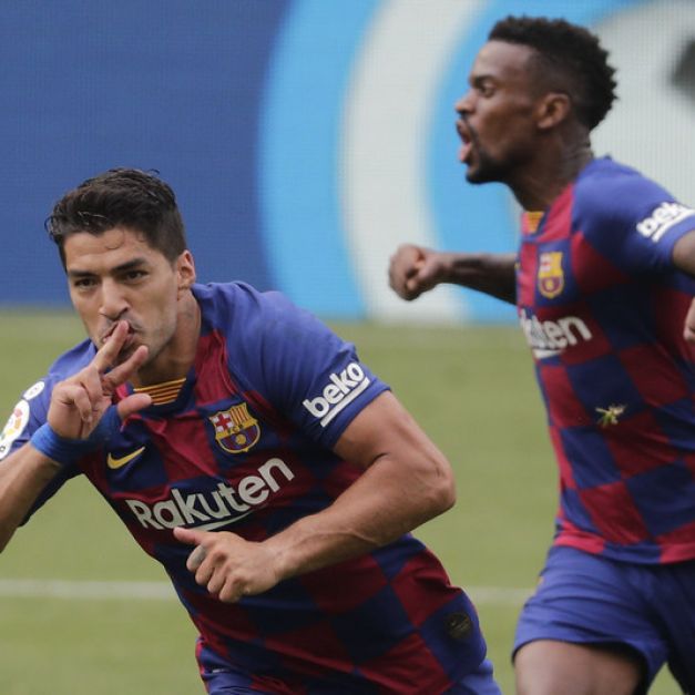 Luis Suarez（左）慶祝進球。（達志影像）